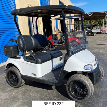 2022 E-Z-GO RXV Elite golf cart in bright white with 14-inch wheels